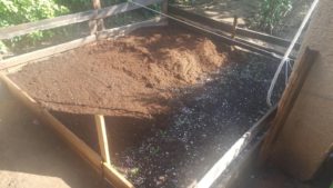 And another layer of soil we bought, now ready for planting. - Compost