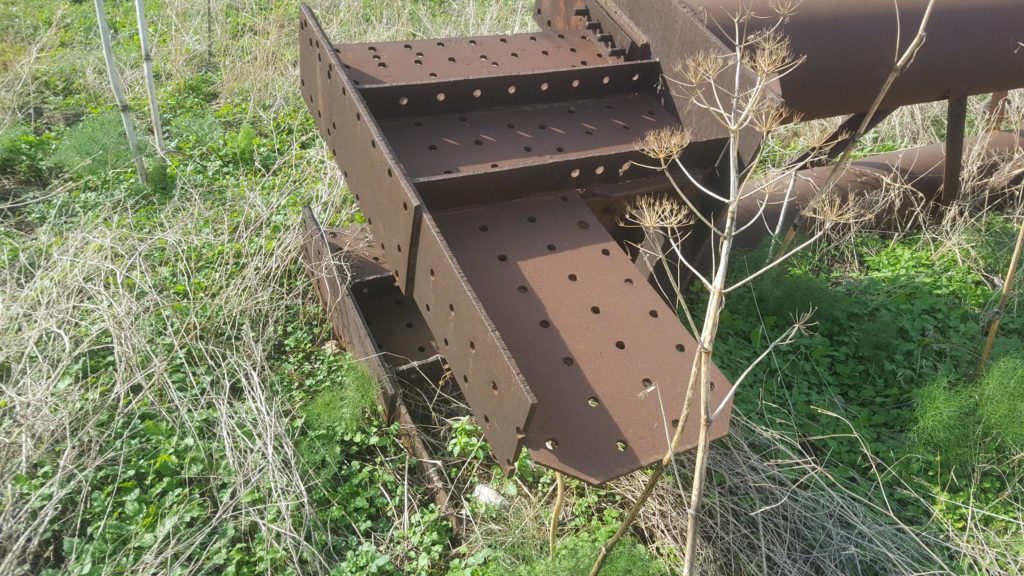 I assume it is part of the demo middle truss, different from the other two which is mainly plates and L angle profiles. Make sense as it was rebuilt by the Canadian Bridge company.