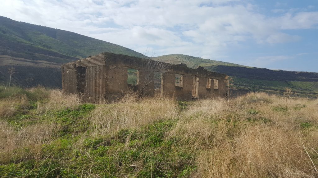 Climbing to the hill with the old un-reinforced building, from here we can see the...