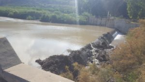 The reservoir, the Dam (the concrete wall infront of us) and the Yarmouk flowing to the right (West)  - Israel-Jordan water share