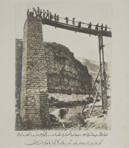 Construction of the stone column at the beginning of the Bridge (Source: www.palestine-studies.org)