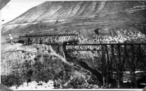 Moving the 120 ton new steel span over the bridge (Source: Australian war memorial) - Damage to Yarmuk Bridge No.2 - Km.93.400 H.R. Main Line on 16/17 June, 1946