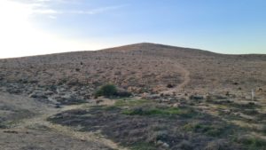 A nice hill with a small hiking trail up