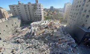 The aftermath of the attack on al-Jalaa tower in Gaza City. [Source: Mohammed Salem/Reuters]