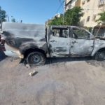 Burnt cars on the morning