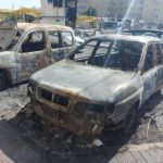 Burnt cars on the morning