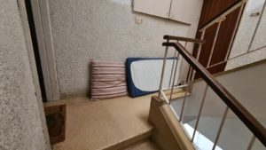 Our staircase with mattress, in case will have to spend the night in it - Living in the shelter