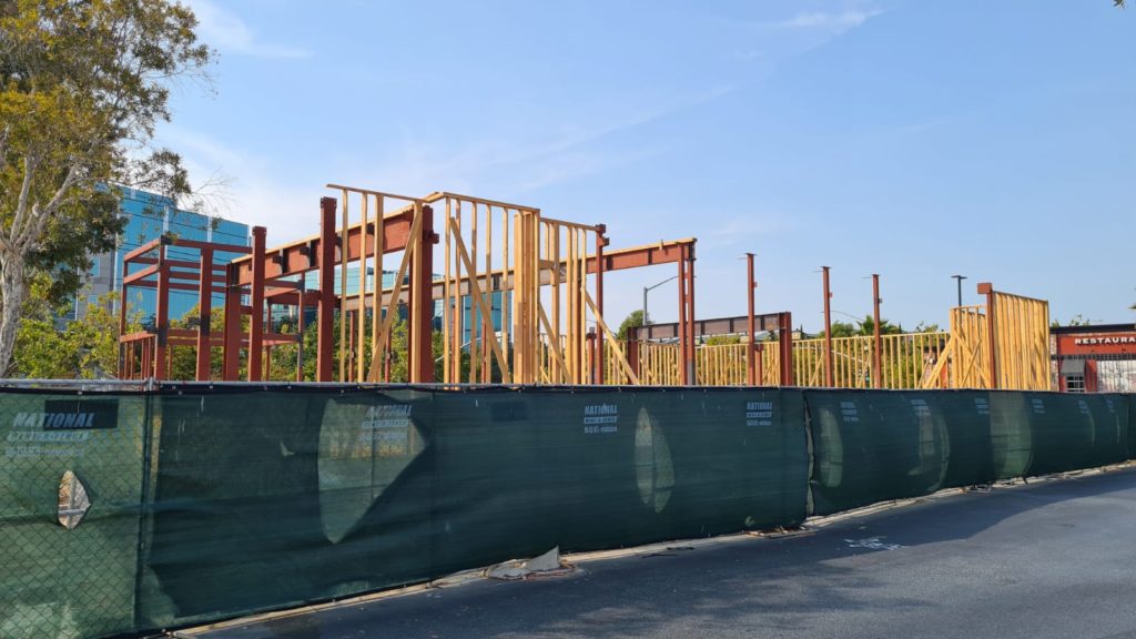 A building made part from mixed steel and wood in one of California endless shopping centers. I am not used to have the skeleton from wood at all. - American construction