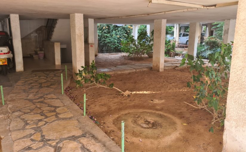 The next door buildimg that houses the composter we use, I use the water to later on clean our composter trash can