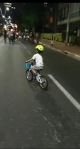 Kippur night and Jannaeus riding his bike along with the rest of the neighborhood - fasting
