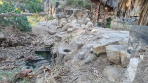 The water from the spring flowing down to the Yarmuk river