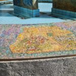 The scenes on the mosaic on the curve around the fountain