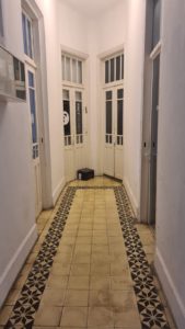 First floor corridor, with original tiles and and special shape. The place hold offices of many kinds. herzl 16