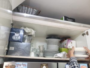 Taking down Passover dishes just before the seder