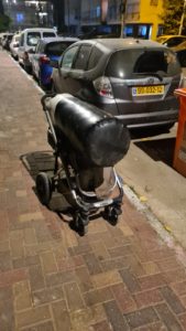 The punching bag on the kids' stroller