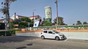 The town water tower, which built on 1937 and decorated with the town historical figures. On the right is the Founders garden, which under renovation at the moment.