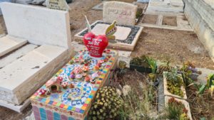 A colorful young girl grave