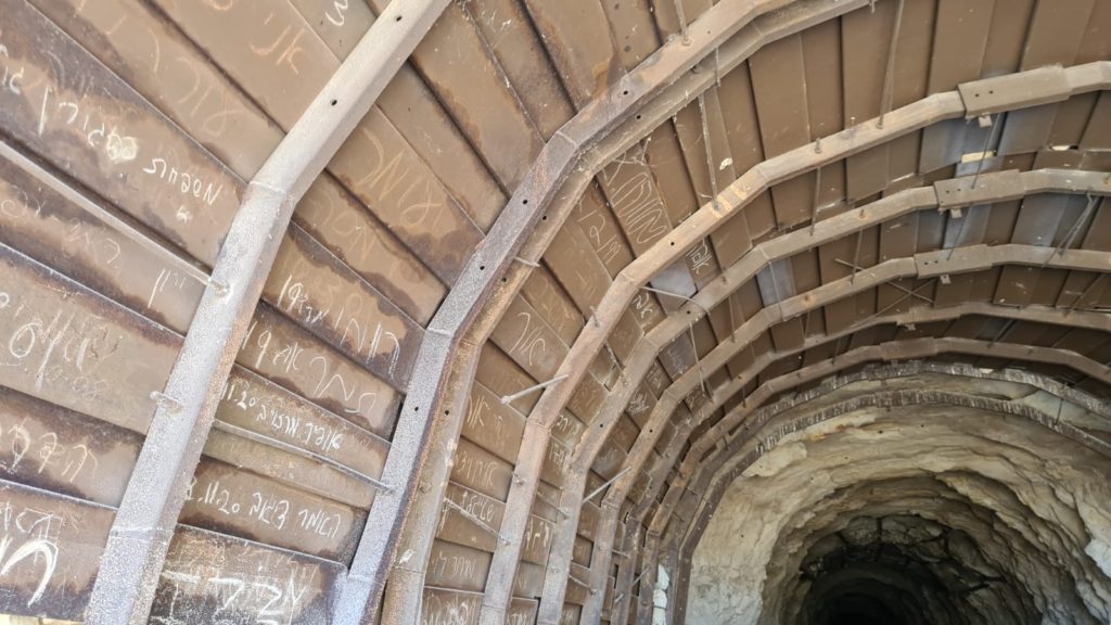 The plates are covered with Arabic and Hebrew graffiti