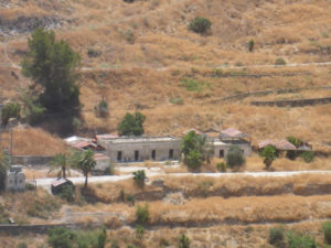 The train station support buildings. All the green fields along Yarmouk between the river and the road here are Jordanian agriculture but is on Israeli territory.