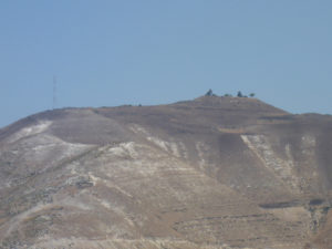 Above the obstacles is a Syrian military post. Those kind are called Syrian Pita as they round and low