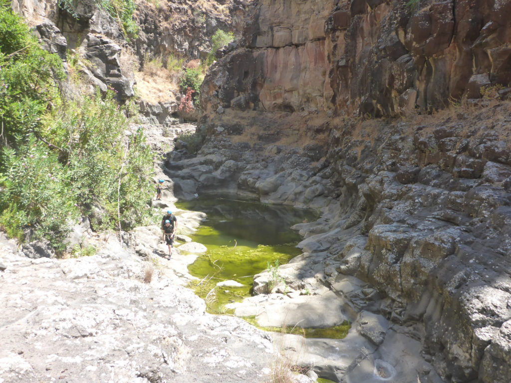 Between the second and third waterfall