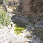 Between the second and third waterfall