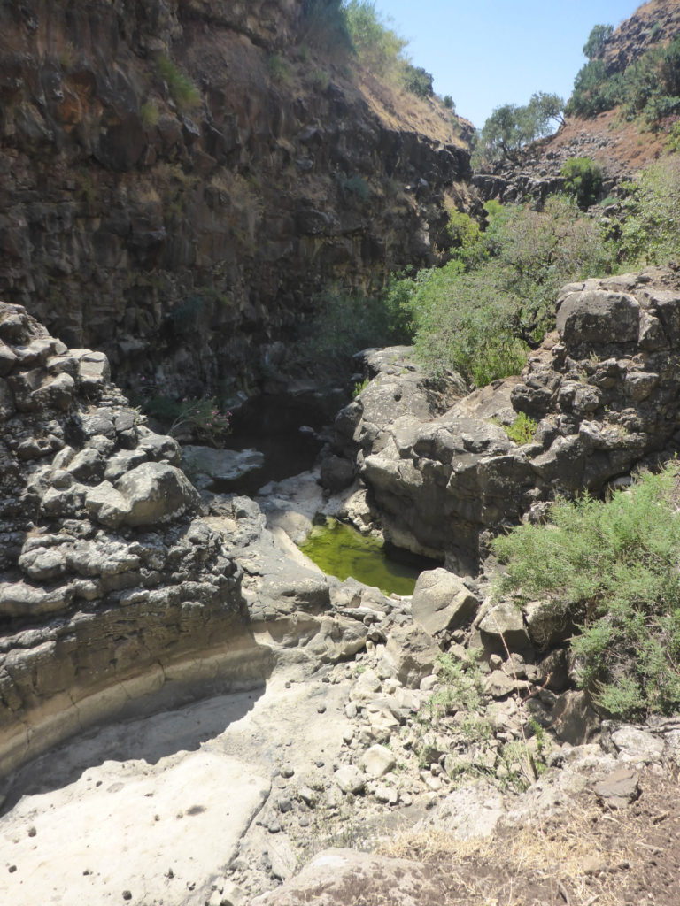 Between the second and third waterfall