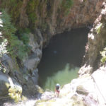 Rappelling down the third waterfall - 20m high with positive slope. On the bottom there is a 50m long pool