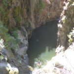 Rappelling down the third waterfall - 20m high with positive slope. On the bottom there is a 50m long pool