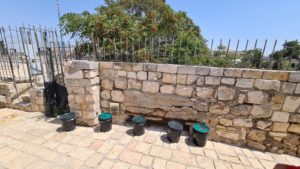 The Jordanian military position - this stone wall built by soldiers of the Jordanian Arab Legion after 1948 combined with the Old city wall to form a communicating trench between the various military positions. The original metal roof and thick overlying layer of sand were removed after 1967