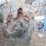 A rock hold by steel cables just above the trail - Nahal Me'arot