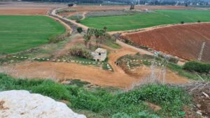 Halfway up the hill. The lake and Hod-HaSharon industry area to the East