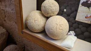 The stones were marked by their size (just like today's bolt caliber) in the Mizgaga
