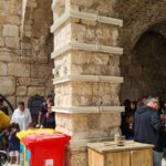 Retrofitting the castle: holding the bottom of the arches (by adding an element that can stand tension on the bottom of the arches) and holding the columns by adding confining steel hoops to hold the columns.