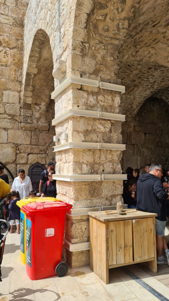 Retrofitting the castle: holding the bottom of the arches (by adding an element that can stand tension on the bottom of the arches) and holding the columns by adding confining steel hoops to hold the columns.