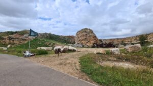 The quarries were use as a place to damp garbage. The site was cleaned up One pile was left as reminder. - Migdal Tsedek