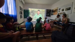 Watching the video at the entrance. We kept those 15 refreshing minutes in the AC to the end of the walk.