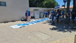 NOAL members posting a sign against the reform in Kaplan - arrested