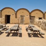 The house of arches from the front and inside (the roof also originally built of the adobe arches). The method of building this way was learned from the Bedouin tribes living around. - Mitzpe Gvulot