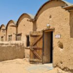 The house of arches from the front and inside (the roof also originally built of the adobe arches). The method of building this way was learned from the Bedouin tribes living around. - Mitzpe Gvulot