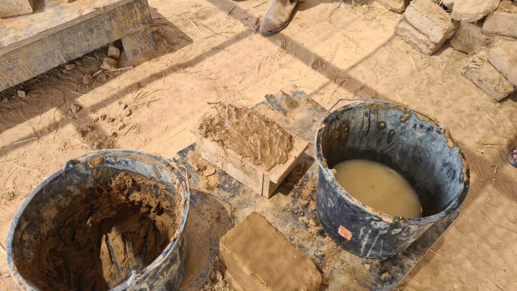 Making adobe stones, the same that used to build the living building
