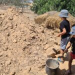 Making adobe stones, the same that used to build the living building