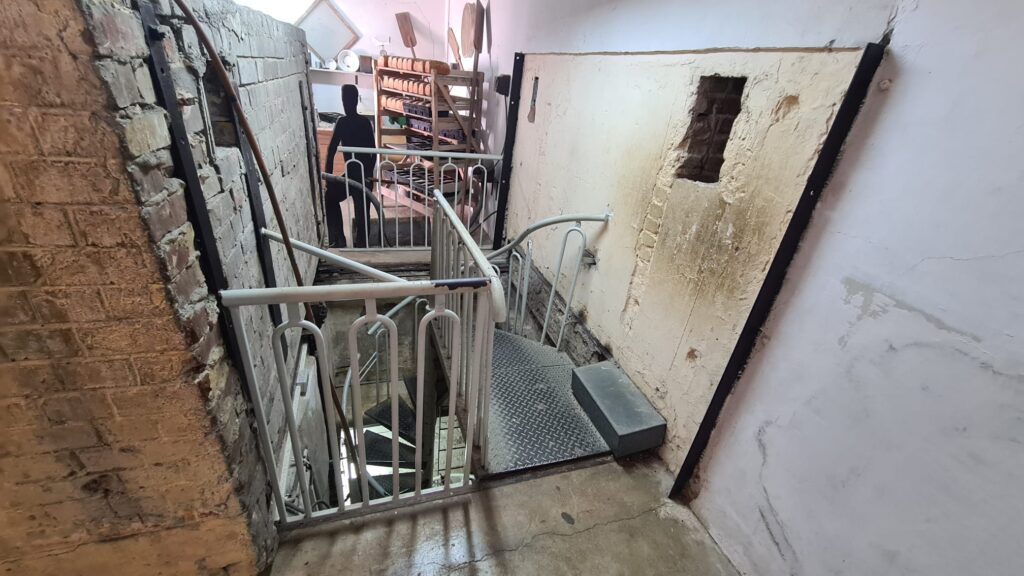 The bakery produced bread for the Kibbutz and Rehovot. The 10 ton oven had rails and covered a bigger access open to the factory which was only used 3 times: to get the machinery in, to once upgrade it and to pull the machinery out. The chimeny used to hid the  pollution from the factory.