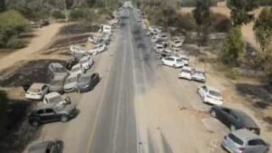 A pic taken from a UGC video posted on the Telegram channel "South First Responders" shows the cars of dead festival participants along the way - the music festival