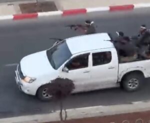 Hamas terrorists on Toyota Hilux in Ofakim - horror