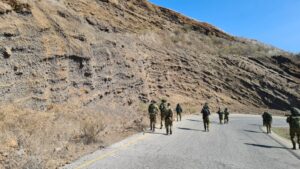 Going down the mountain, look on the geological cut in the mountain made of curved layers of Basalt and Tuff