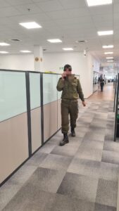 co-worker at the factory, who decided to come to work while in an after from reserve duty, with his uniforms still on him.
