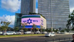 United we will stand sign on Azrieli center on the democracy square