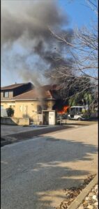 The burning house in Kfar Yuval (Source: HaHaretz. co. il) - action
