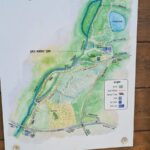 A sign when climbing up from the short part of the wet trail (the long one stretch to Kibbutz HaGoshrim) with a map of the nature reserve and a map around the nature reserve.